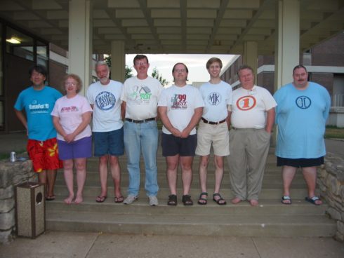 KansasFest attendees wearing shirts representing the event's different years